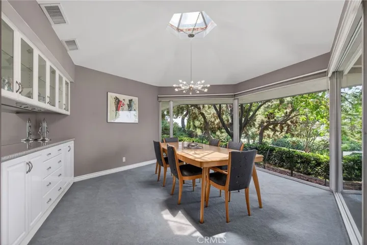 Hexagonal dining room with cupola overlooking front views