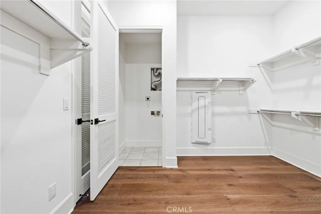 Primary Master On-Suite Walk In Closet Laundry Area on Floor 1