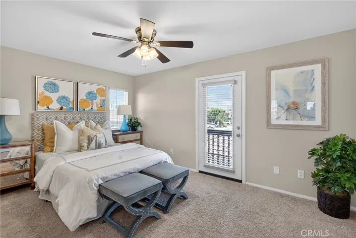 upstairs bedroom with small balcony