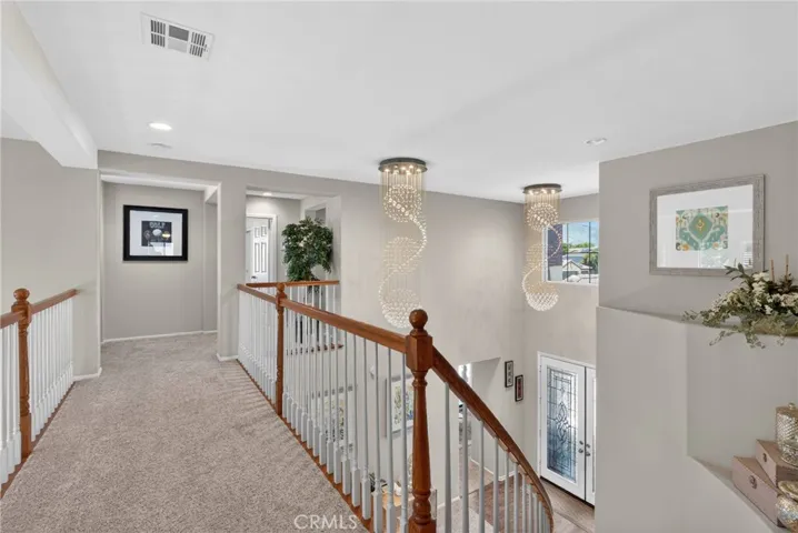 catwalk looking towards 2 bedrooms with jack and Jill bathroom