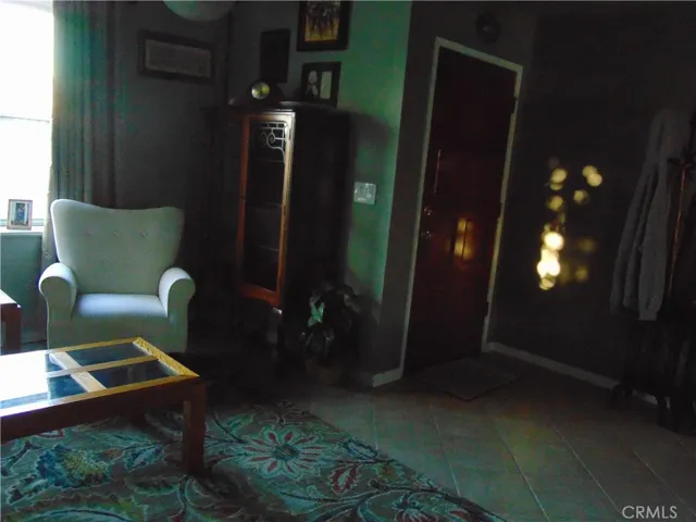 living room towards front entry door.