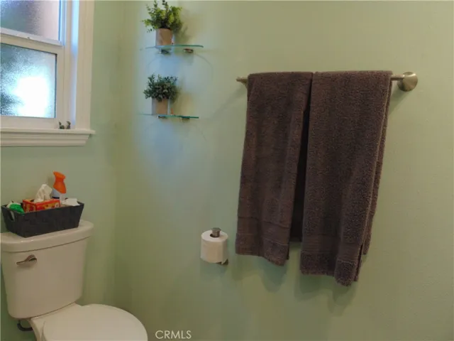 master bath, glass shelving remains