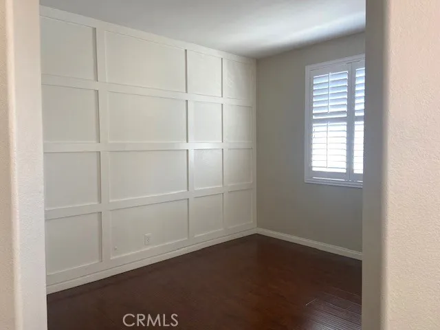 Open Office enjoys Custom Wood Panels on Wall.