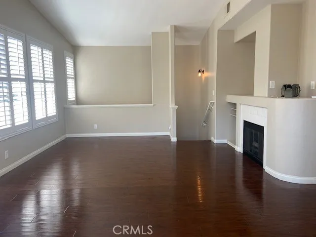 All Living Upstairs. Living Room Fireplace, Wall of Windows.