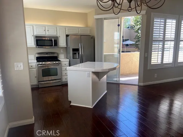 Kitchen with Island, Appliances, Great Storage, Slider to Balcony.