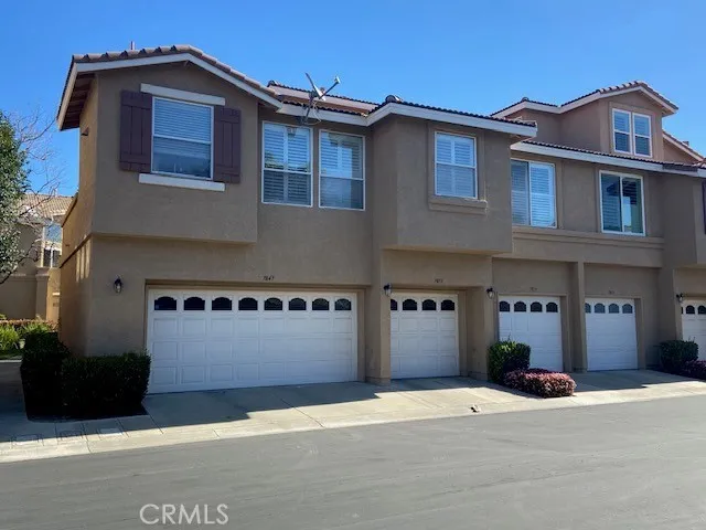 Exterior of Menton Property.  2 car Garage is the Left side End Unit.