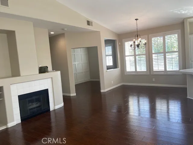 Another View of Living Room to Dining Area.