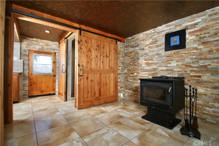 Downstairs area with wood burning stove