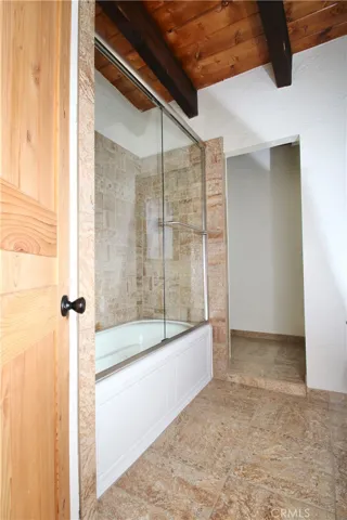 Upstairs guest bath tub and shower