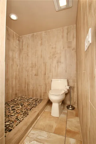 Downstairs bath and tiled shower