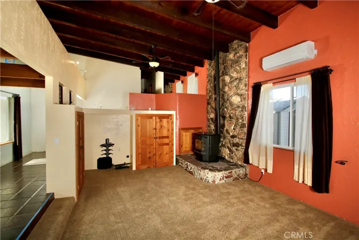 Living room with Pellet Stove and Mini-Split