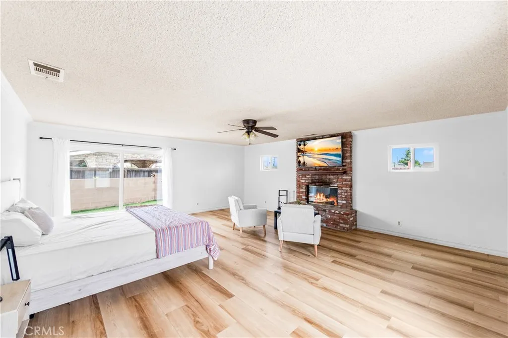 Primary bedroom with fireplace