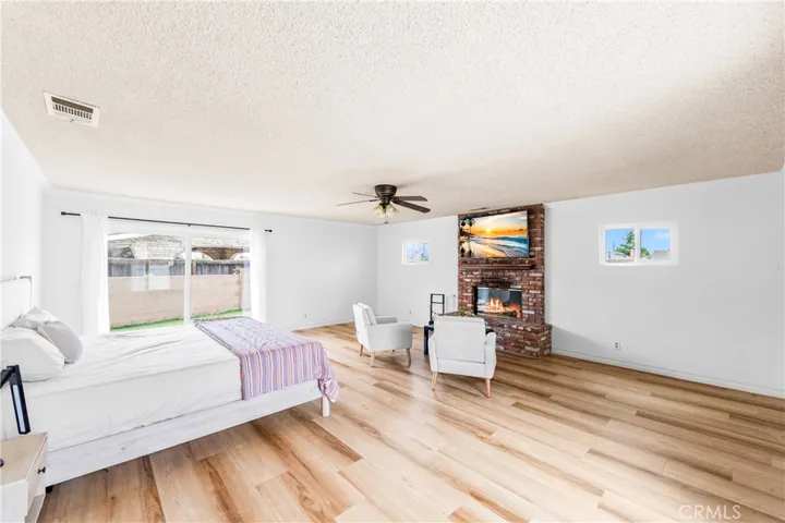 Primary bedroom with fireplace