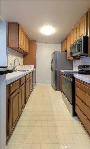 Kitchen with ample cabinets for storage