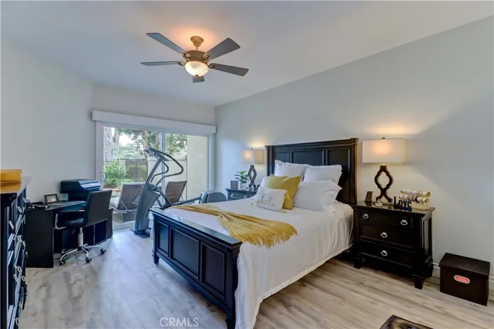 Main floor primary bedroom with view of the golf course.