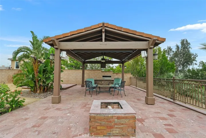 Custom gazebo and stone fire pit