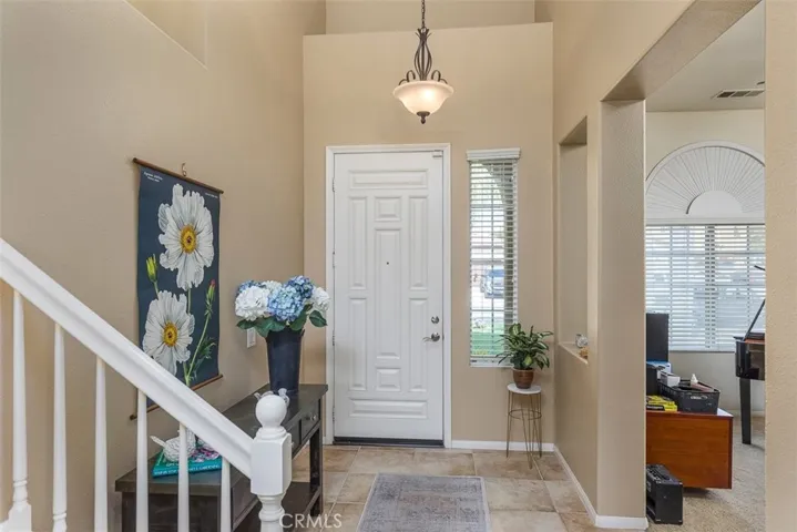 Entry/Foyer, with Den/Music Room to the right in the picture