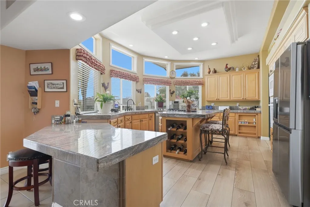 Alternate view of kitchen showing breakfast bar