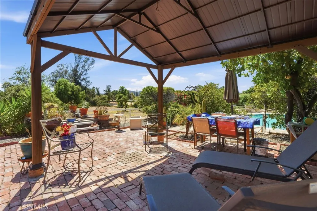 Additional coverage patio area at north side of pool