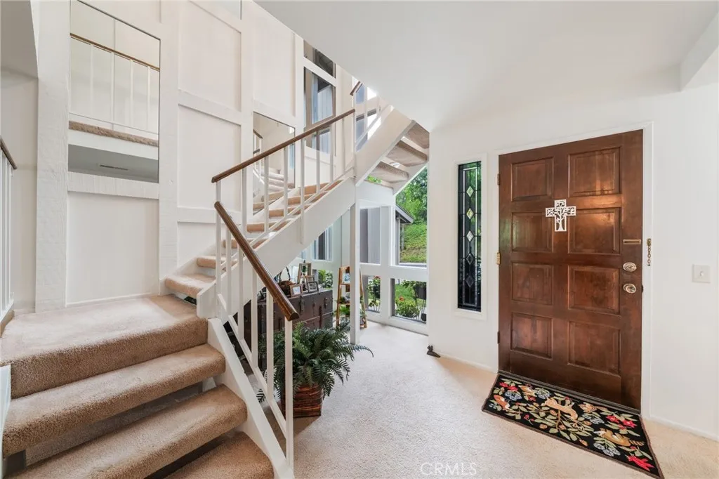 Entry with soaring celings and atrium