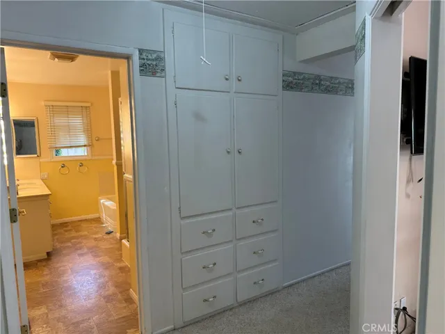 Hallway cabinets outside master bathroom
