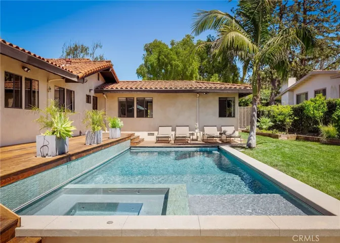 Pool back deck, and grass area upper yard