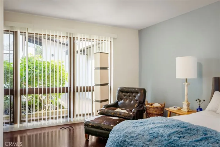 Bedroom four/ Office with wall of glass towards courtyard