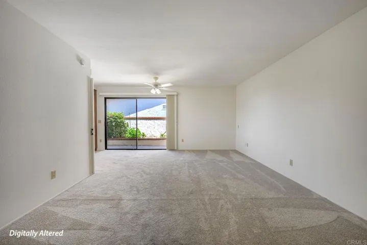 Family room to right of front door entry and open to kitchen~