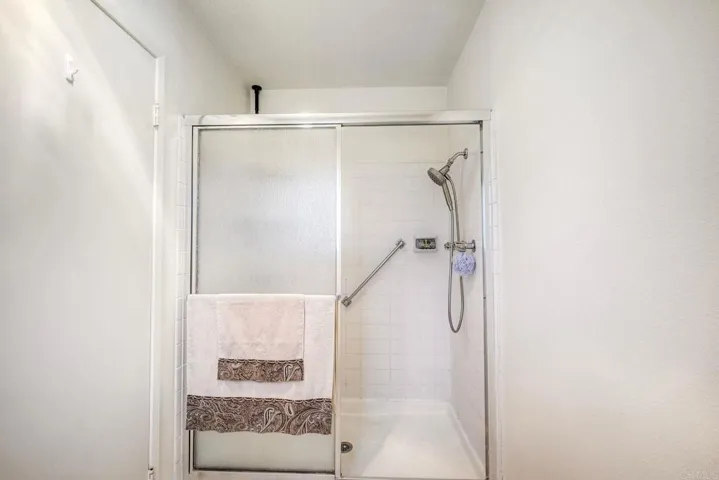 Walk-in shower at primary bathroom~