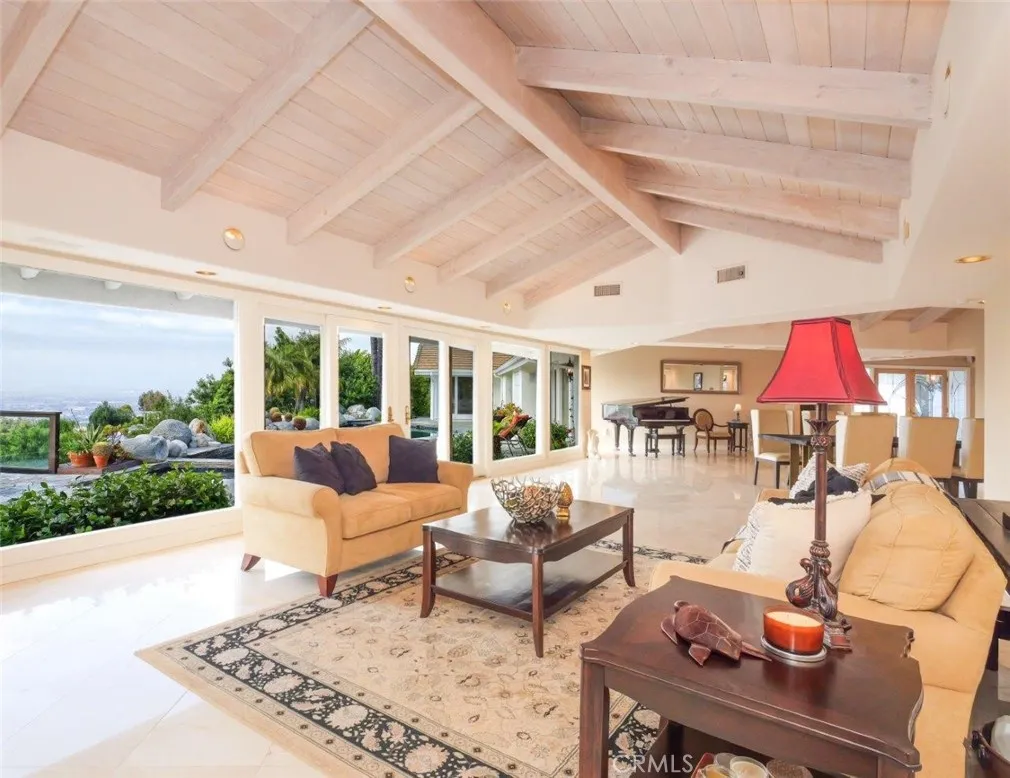 Formal Living Room Looking Out to Pool & View