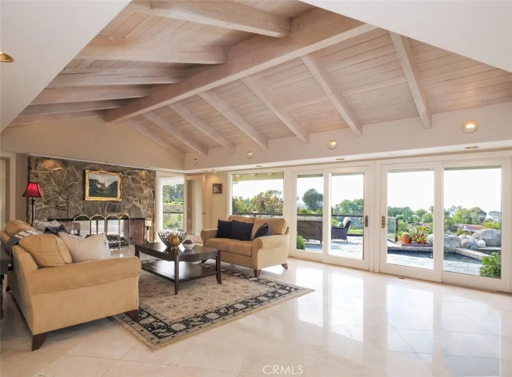 Formal Living Room Looking Out to Pool & View