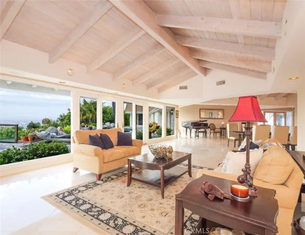 Formal Living Room Looking Out to Pool & View