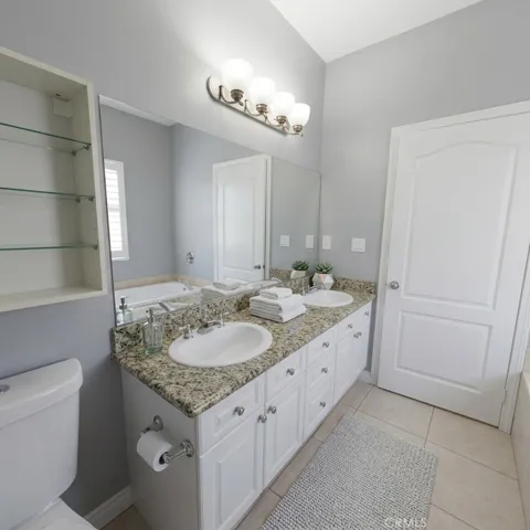 Master bathroom with granite double sinks