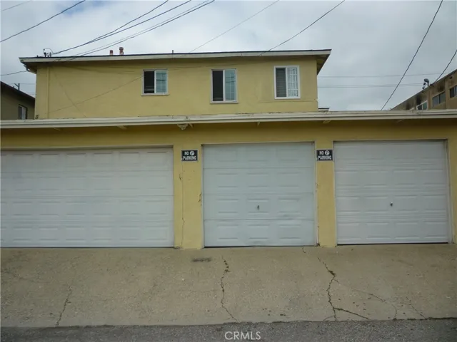 The single car garage at the far right is assigned to unit #1.