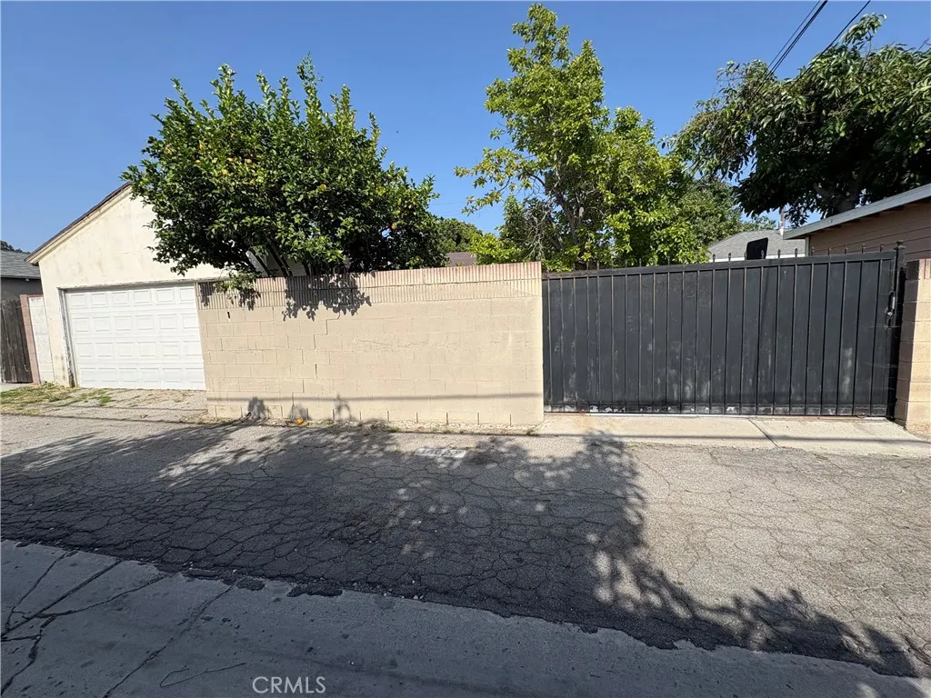* Gate Leading Into Back Yard