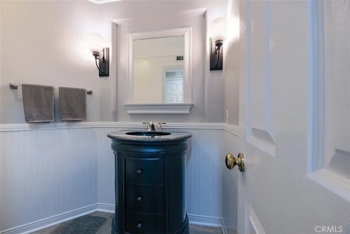 Powder room on lower level.