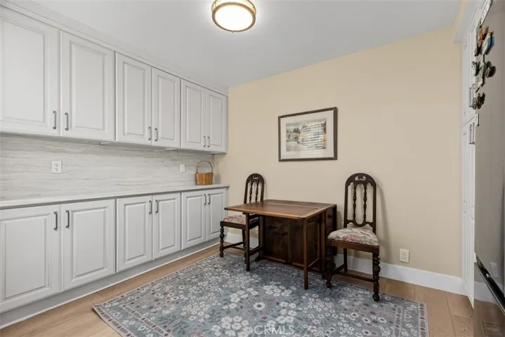 Kitchen area with small table & chairs