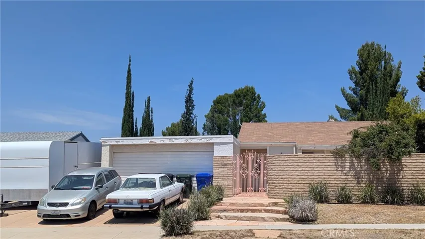 Front of Home- Gated Courtyard entrance, RV parking