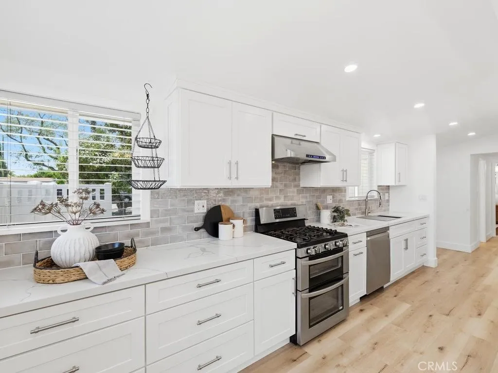 Highly Updated Kitchen with pullouts throughout
