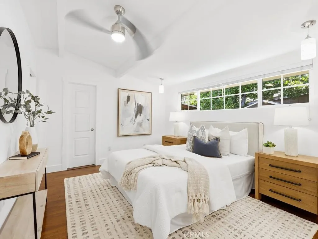 Primary Bedroom with Original Hard wood flooring.