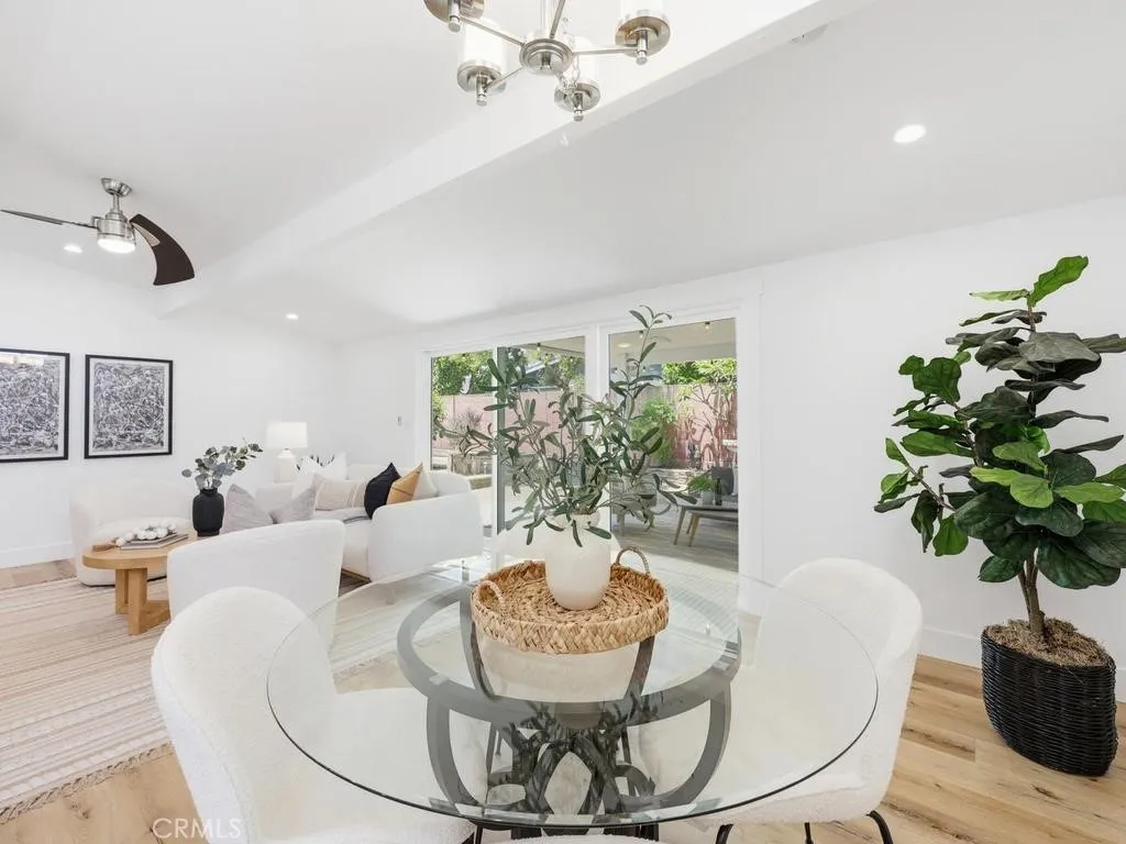 Lots of Natural Light with the Large Window and Sliding Glass door