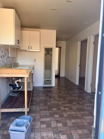 House 1B kitchen area