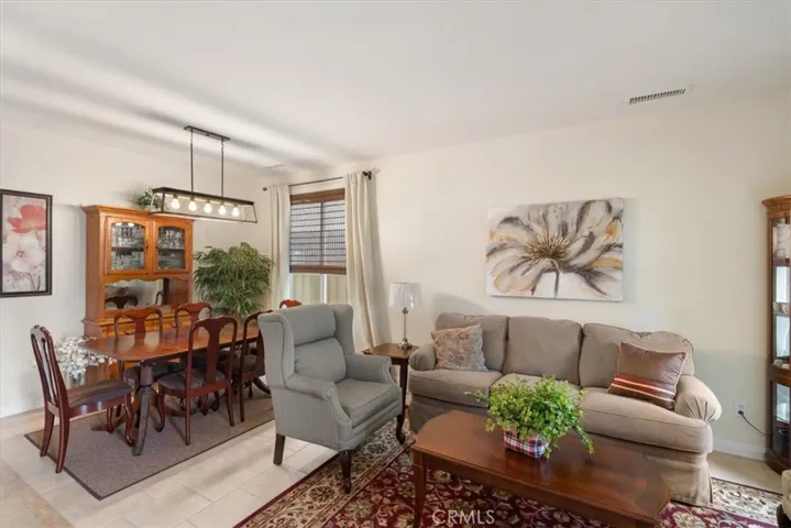 Entry Living room with dining room