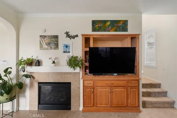 Family room with built-in fireplace and entertainment unit
