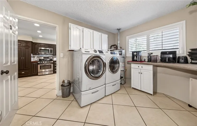 Laundry room view from garage entry.