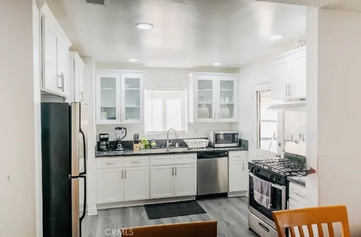 Kitchen With Newer White Cabinets