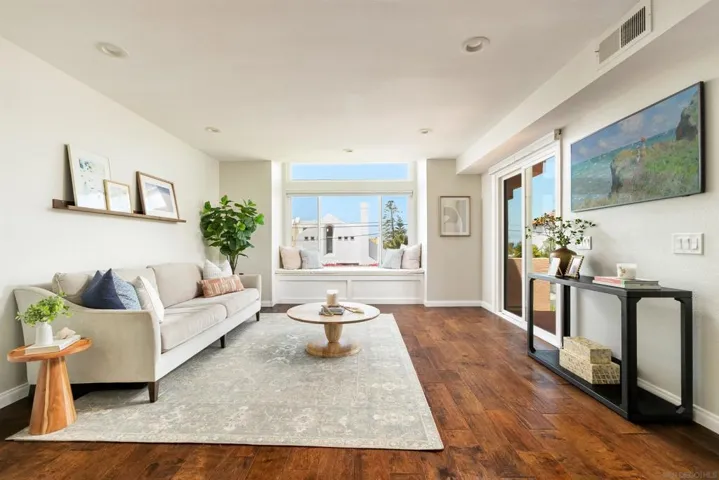 Living room at entry of the home with ocean views