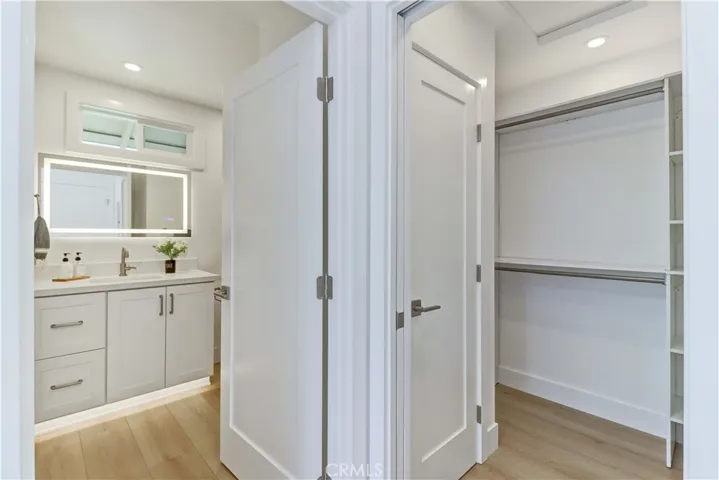 Primary Bedroom Walk-in Closet & En Suite Bathroom