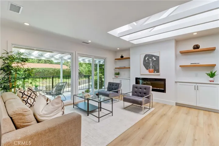 Living Room Skylight over Exposed Ceiling Beams
