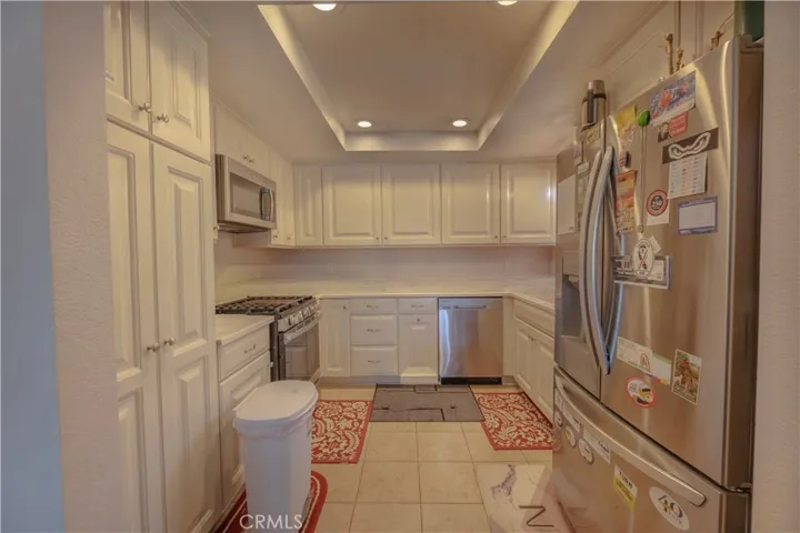 Remodeled kitchen with stainless steel appliances.